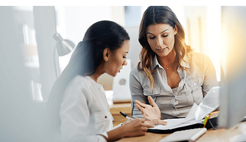 Woman Talking to Her Boss at Work