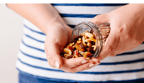 Woman Eating Healthy Snack