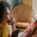 person contemplating looking out window