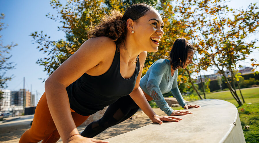 Two people exercising outdoors