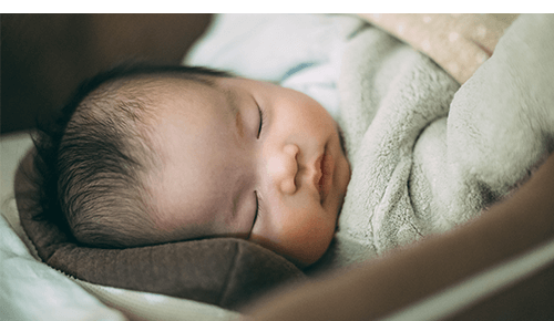 Baby sleeping in blankets