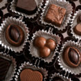 Box of a variety of chocolate truffles and squares