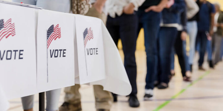 Line of people waiting to vote at polling location