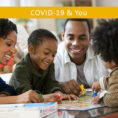 Family playing board game