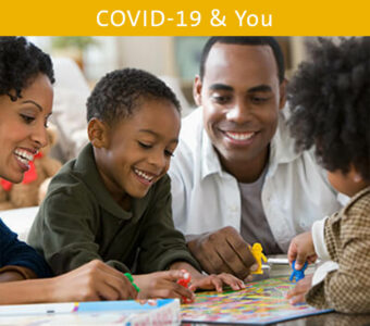 Family playing board game