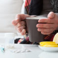 Person holding mug