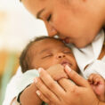 Mother holding newborn baby