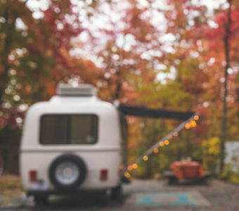 Camper set up in woods