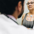 Patient talking with their doctor during a cardiopulmonary stress test on a hospital