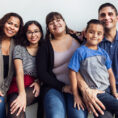 Hispanic family smiling together