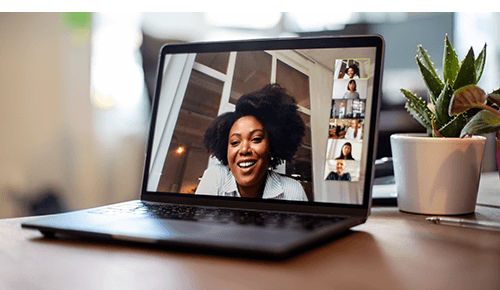 Computer with a virtual group on the screen talking