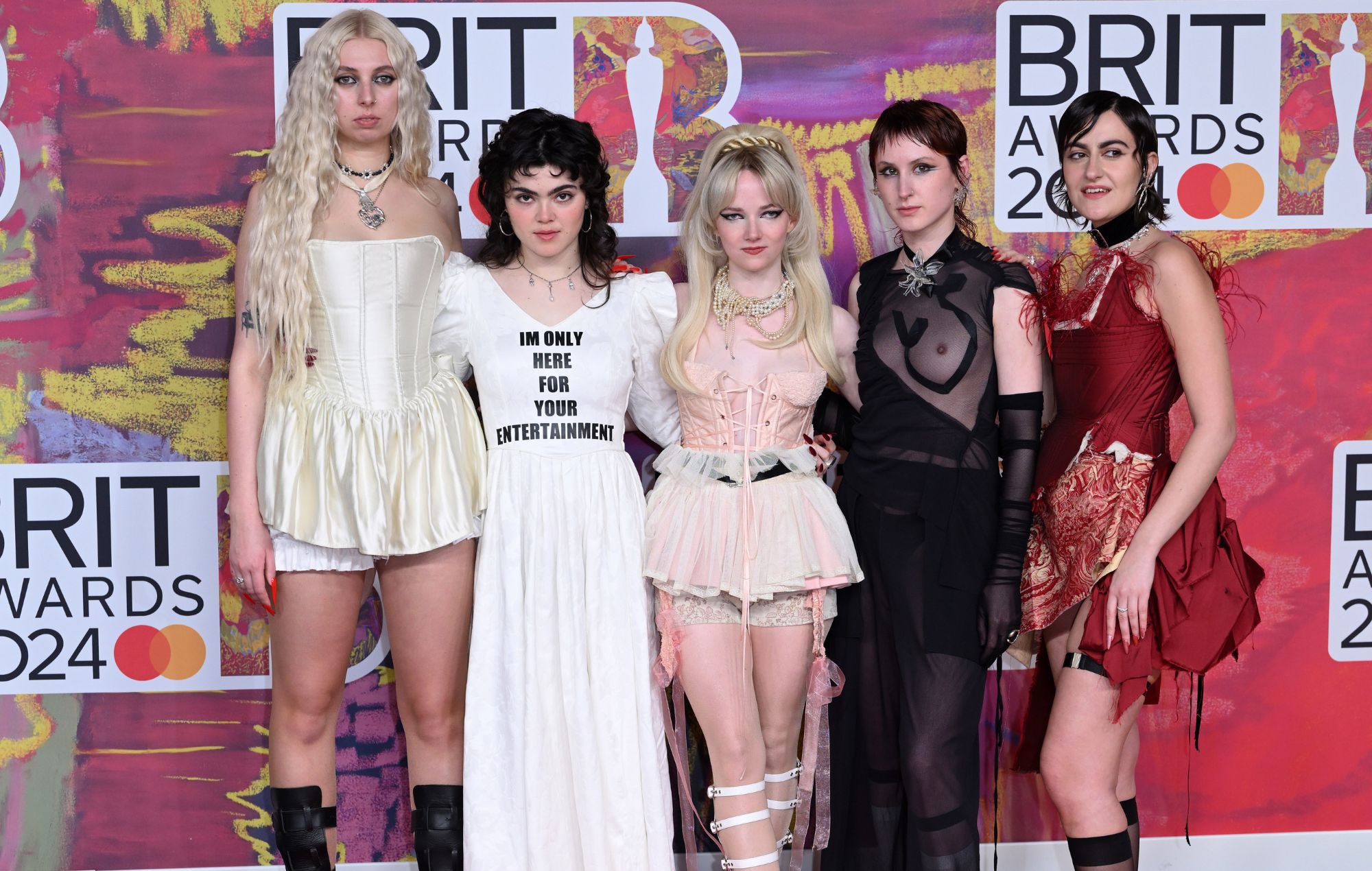 Georgia Davies, Abigail Morris, Emily Roberts, Lizzie Mayland and Aurora Nishevci of The Last Dinner Party attend the BRIT Awards 2024 at The O2 Arena on March 02, 2024 in London, England.