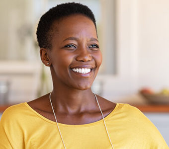 Woman smiling past camera