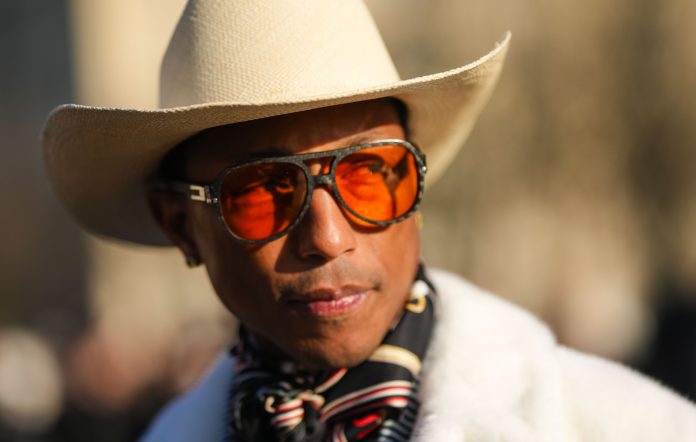 Pharrell Williams at Paris Fashion Week A/W 2024/2025. Photo credit: Edward Berthelot/Getty Images